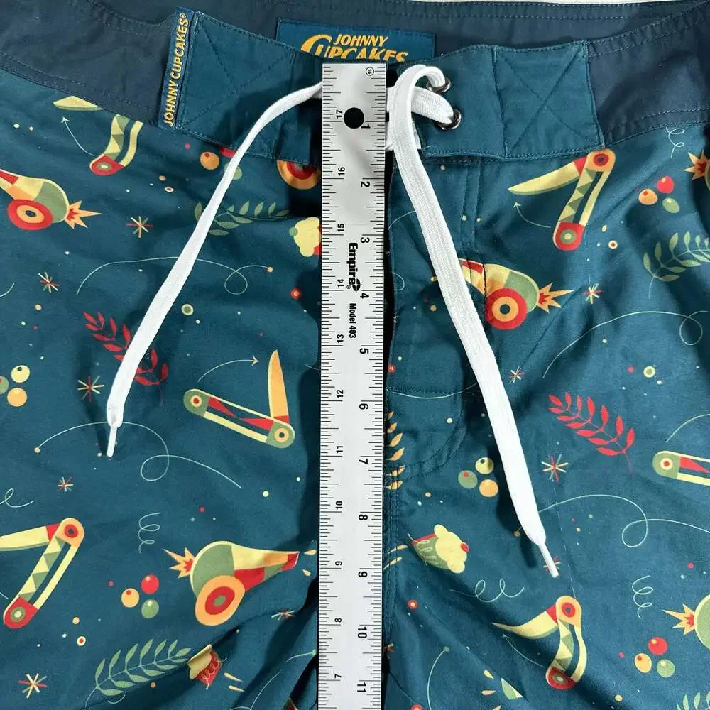 Johnny Cupcakes All-Over Print Cannon and Knife Pattern Swim Boardshorts